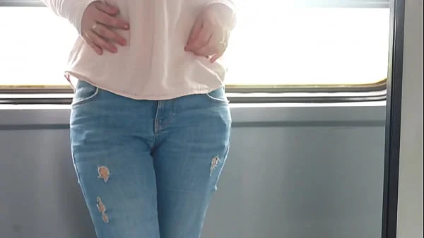 An unknown girl touches my dick in the train and then I jerk off in the bathroom.