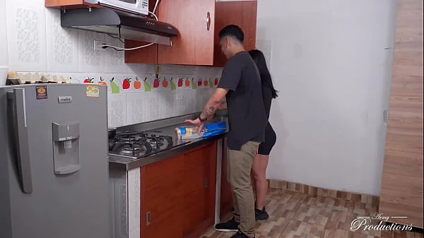 While I'm cooking with my stepbrother I feel a big cock between his pants and we end up fucking