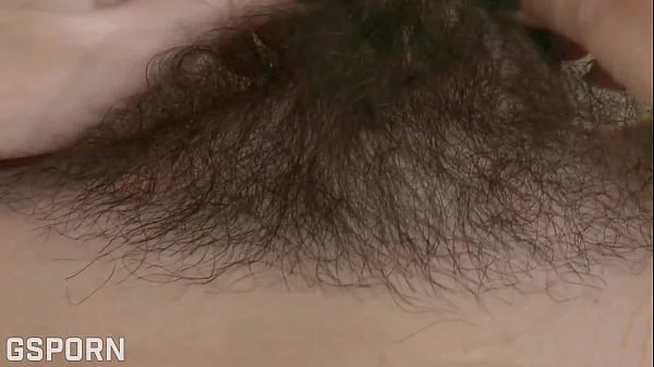 Hot natural brunette girl masturbating her hairy pussy