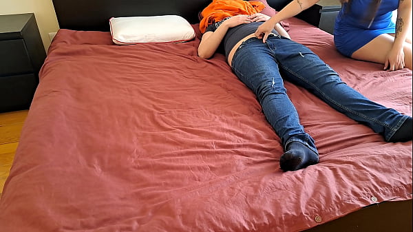 Wife puts on music and is shared in a trio with her husband without him noticing