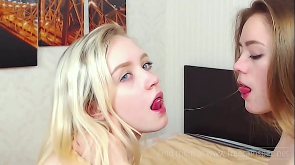stunning teen cam lesbian licks and spits on her stepsister's face